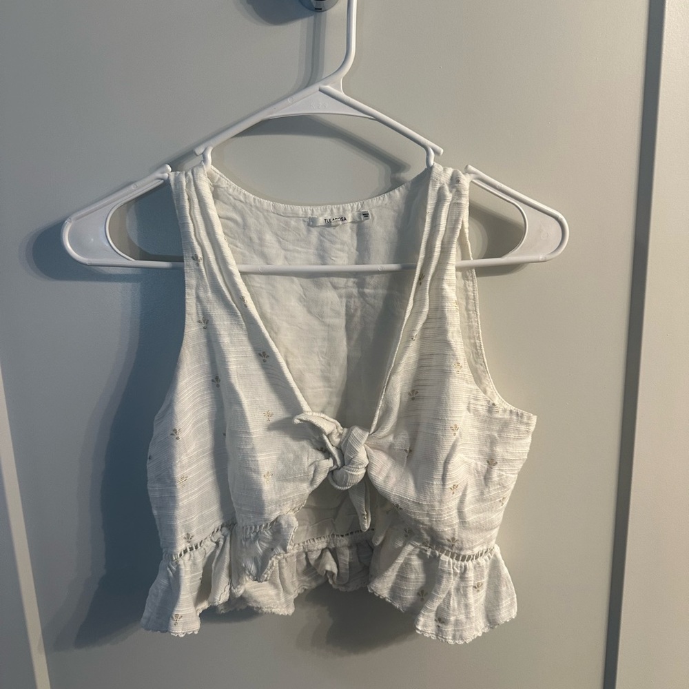 White Sleeveless Crop Tank Top with Plunge Neckline and Ruffled Hem